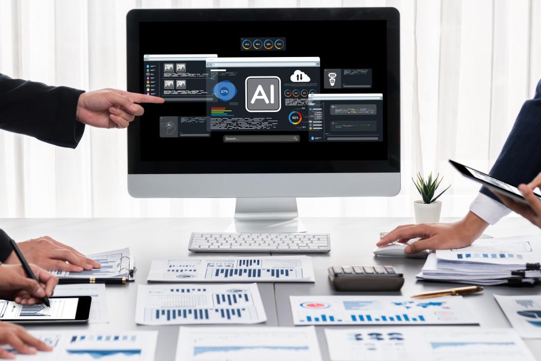 Eine Gruppe an Ingenieuren benutzet einen KI-Assistenten zur Unterstützung bei ihrer Auswertung